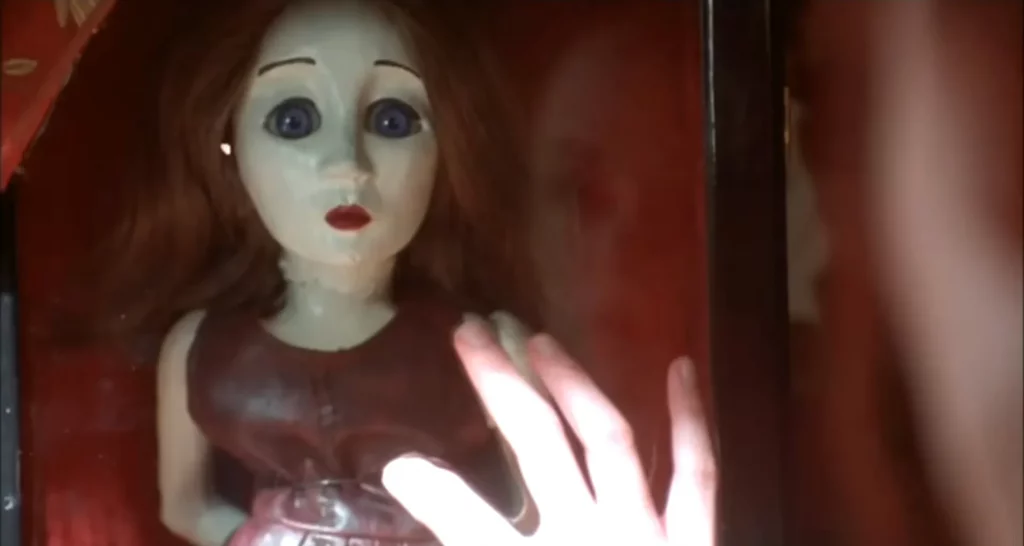 A screenshot from the movie May (2002)