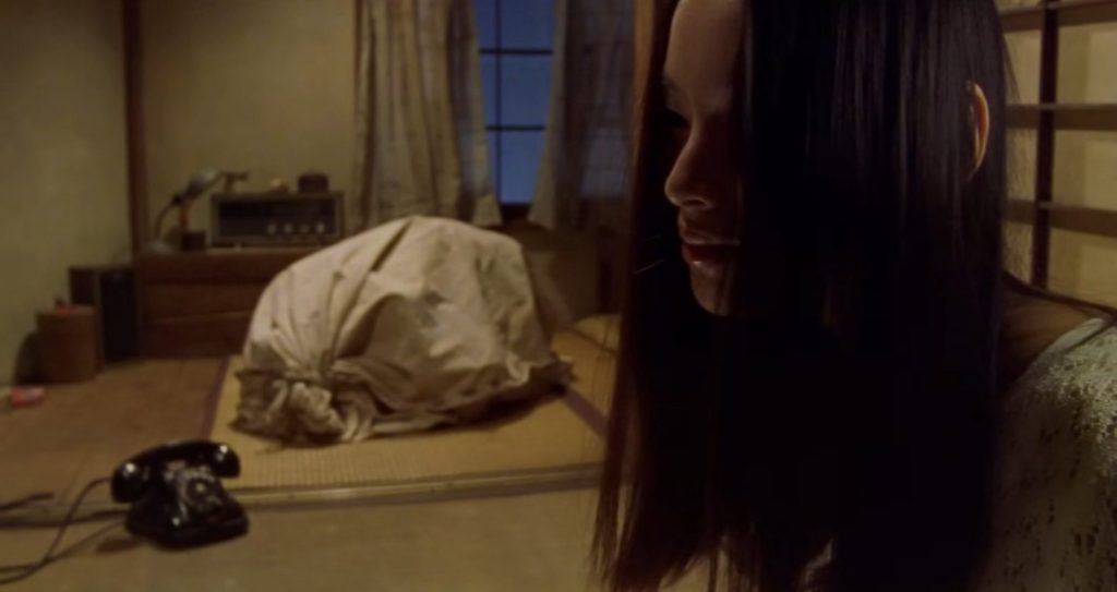A screenshot from Japanese horror movie Audition (1999)