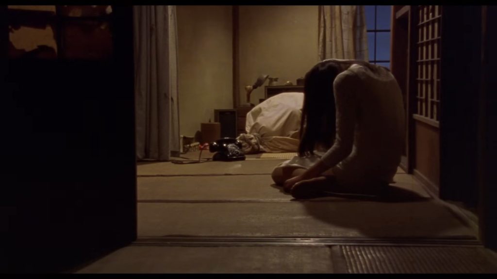 A screenshot from Japanese horror movie Audition (1999)