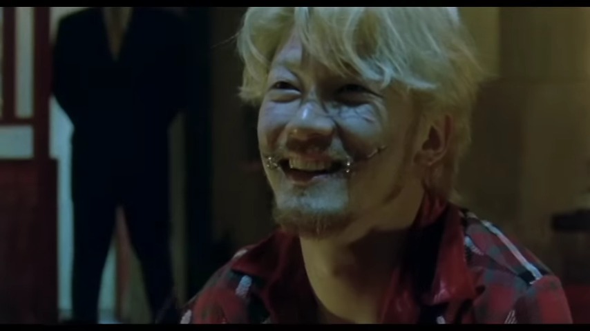 A screenshot from Japanese manga adaptation horror movie Ichi the Killer (2001).