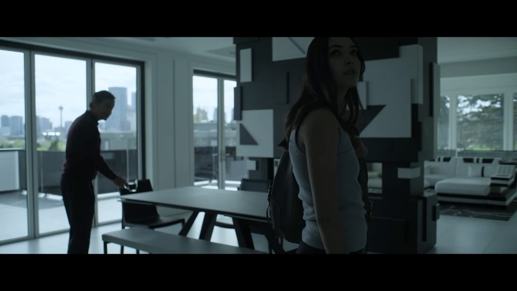 A screenshot from AI themed horror movie Romi (2023)