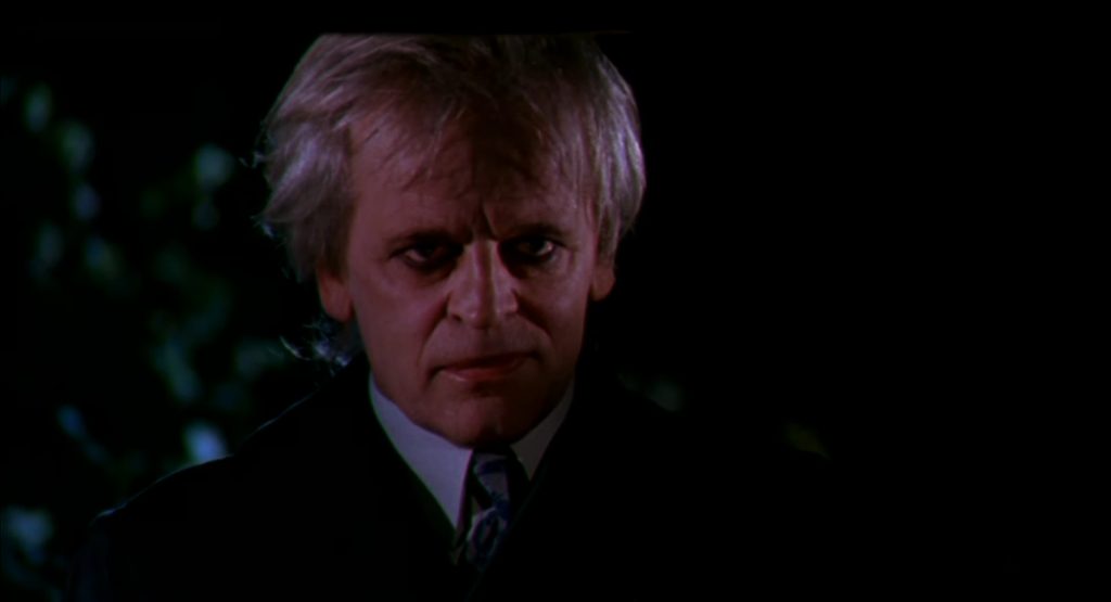A screenshot from horror movie Crawlspace (1986)