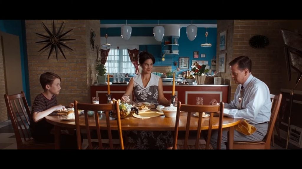 A screenshot from zombie horror comedy movie Fido (2006)