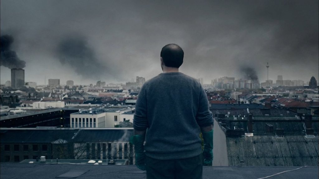 A screenshot from German Zombie horror movie Rammbock (2010)