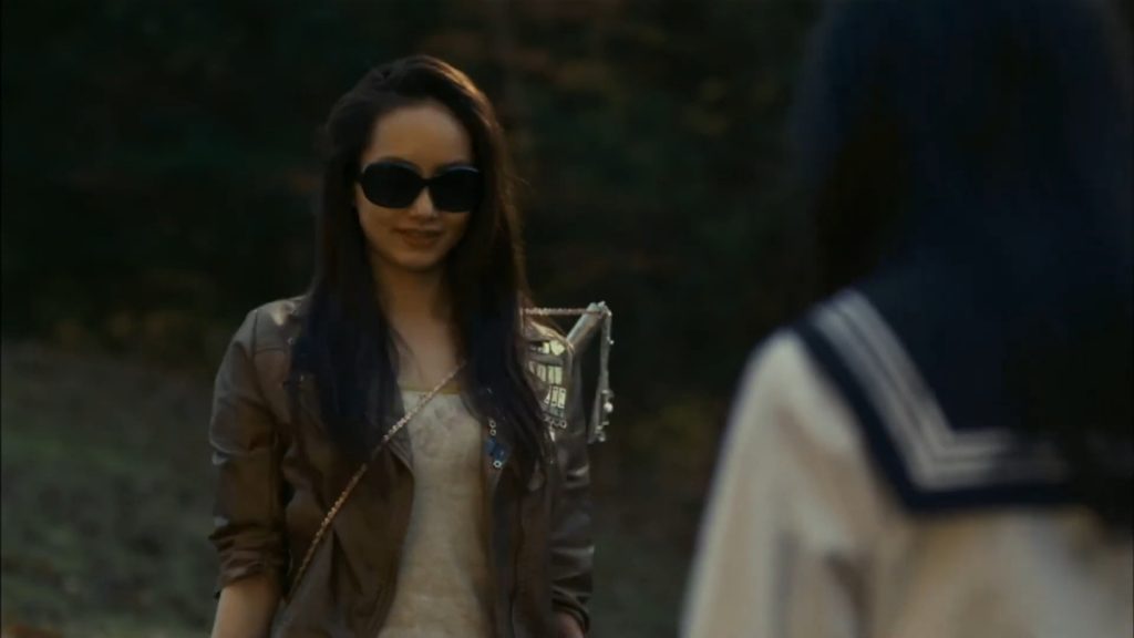 A screenshot from zombie horror movie Schoolgirl Apocalypse (2011)