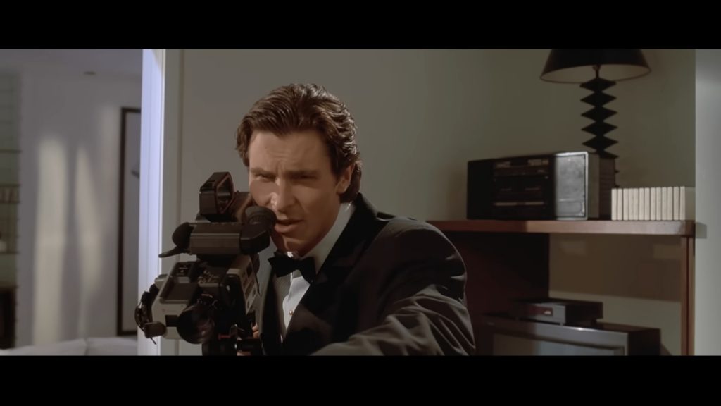 A screenshot from comedy horror movie American Psycho (2000)