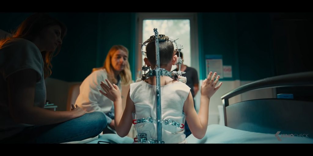 A screenshot from body horror movie Titane (2021)