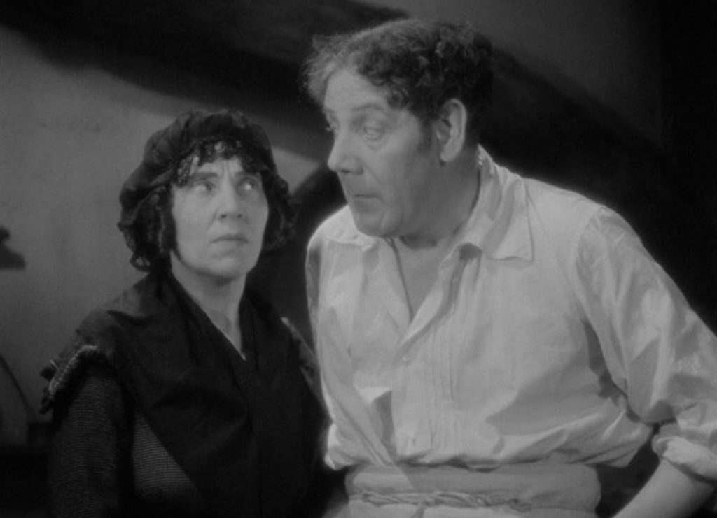 A screenshot from crime drama movie Sweeney Todd: The Demon Barber Of Fleet Street (1936)