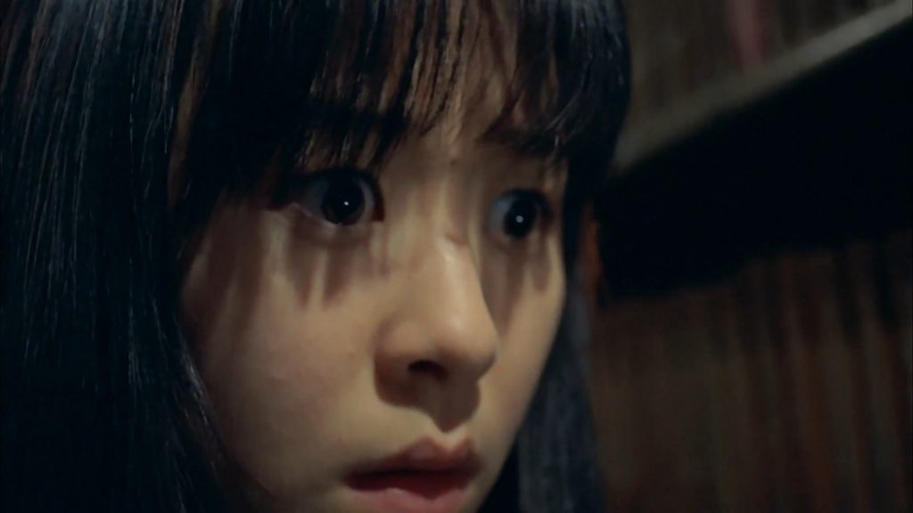A screenshot from South Korean horror movie Whispering Corridors (1998)
