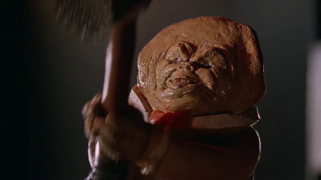 Close-up of the killer gingerbread man holding a weapon in the B-movie horror comedy The Gingerdead Man.