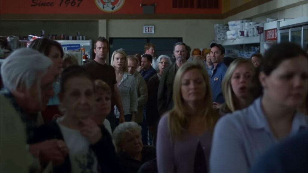 A tense group shot from the 2007 film The Mist.